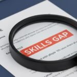 Magnifying glass over a resume with “skills gap” highlighted, career advisory, service request